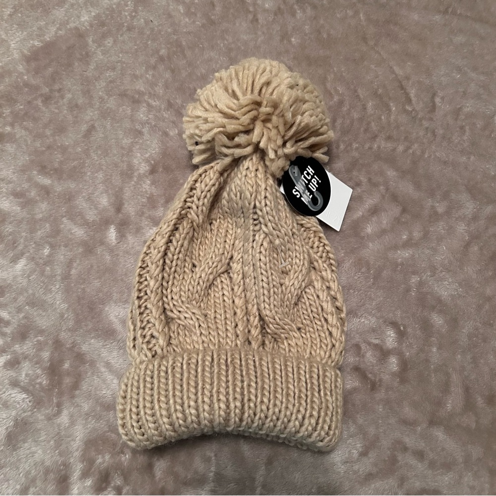 NWT tan beanie with removablee pompom